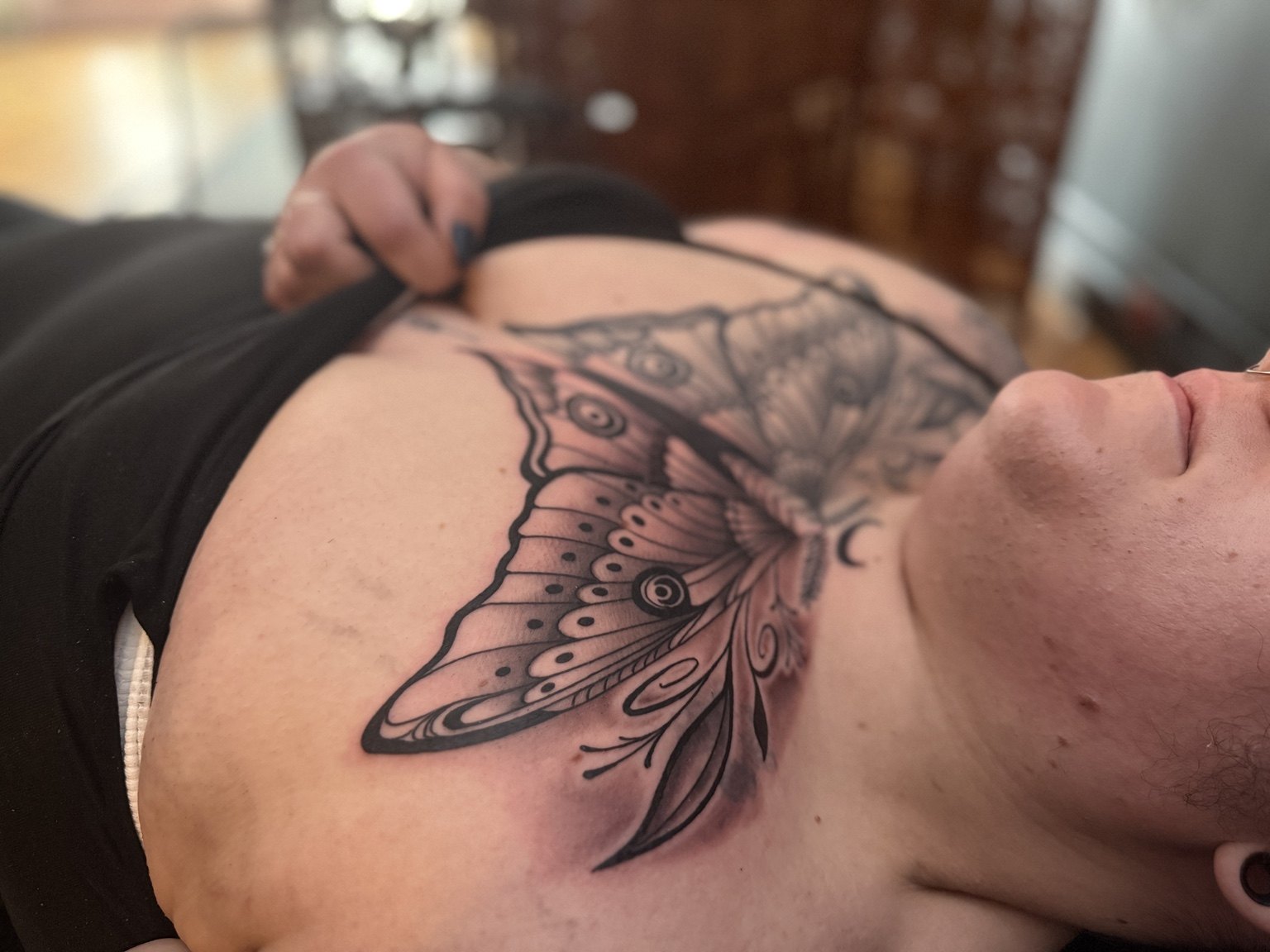Butterfly chest tattoo