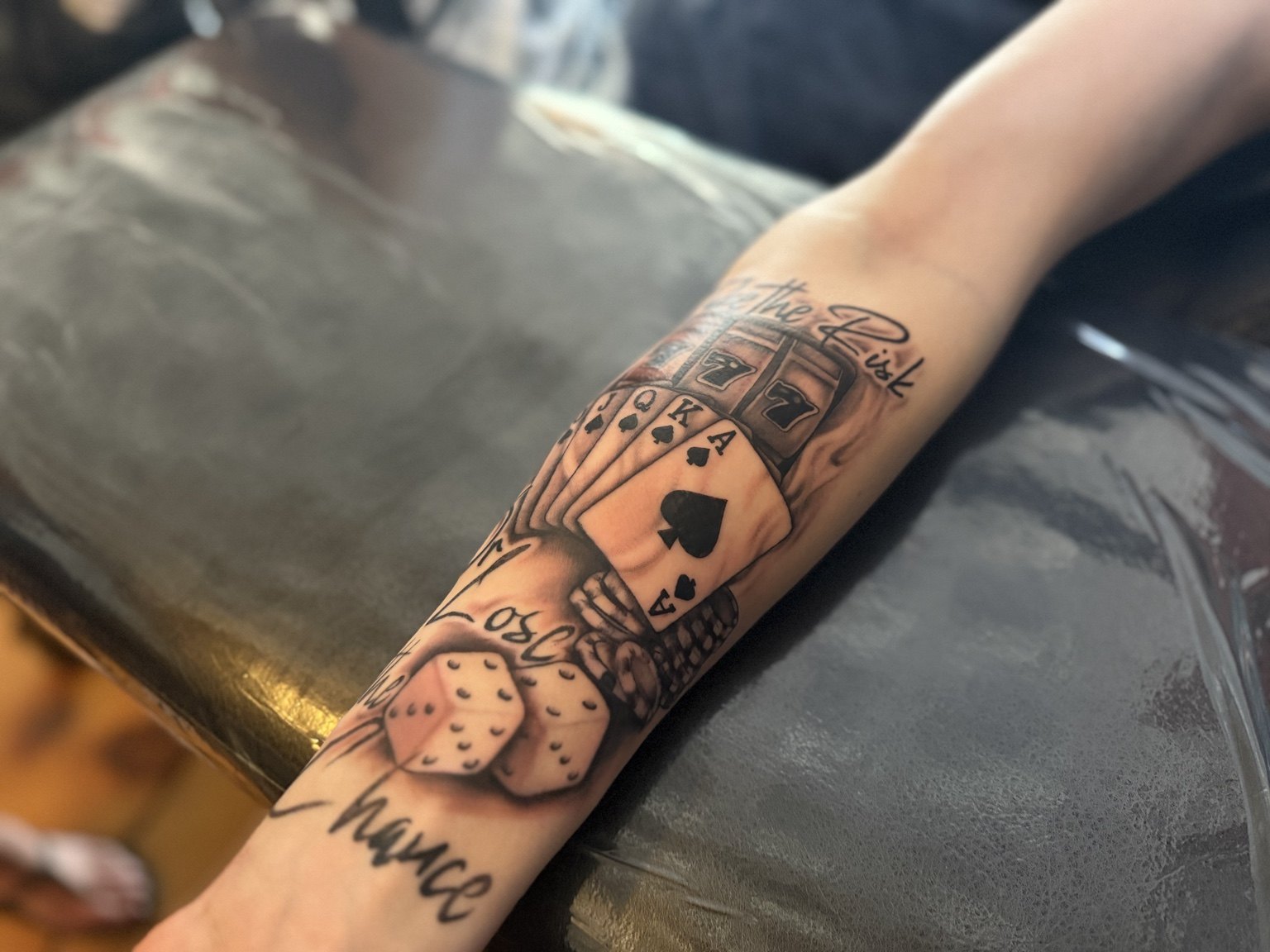 Gambling tattoo with cards dice and slot machine