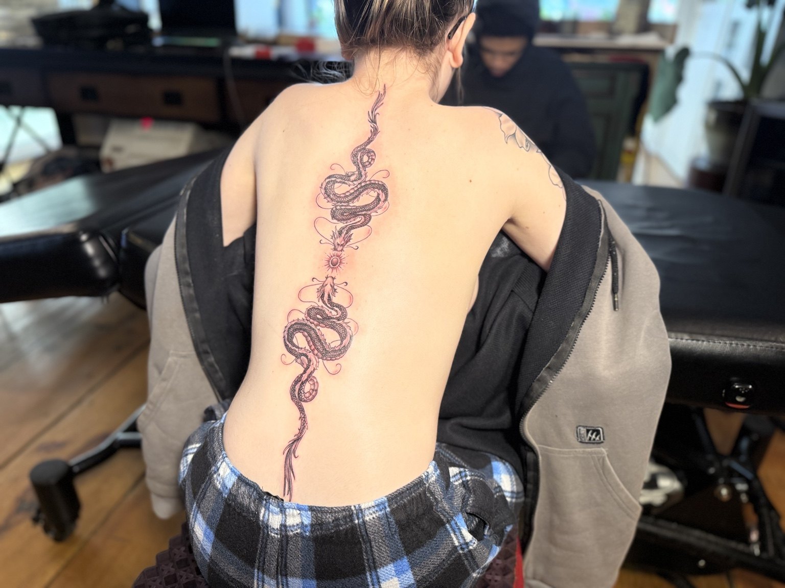 Snake spine tattoo